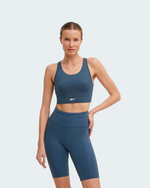 Top Rebook Train High Support Mujer